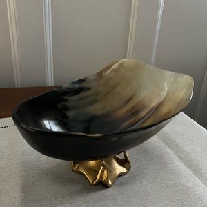 Black decorative bowl crafted from natural horn.